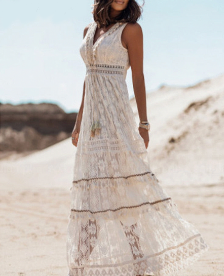 Robe longue d'été bohème pour femmes, idéale plage et vacances, style fluide chic et décontracté.