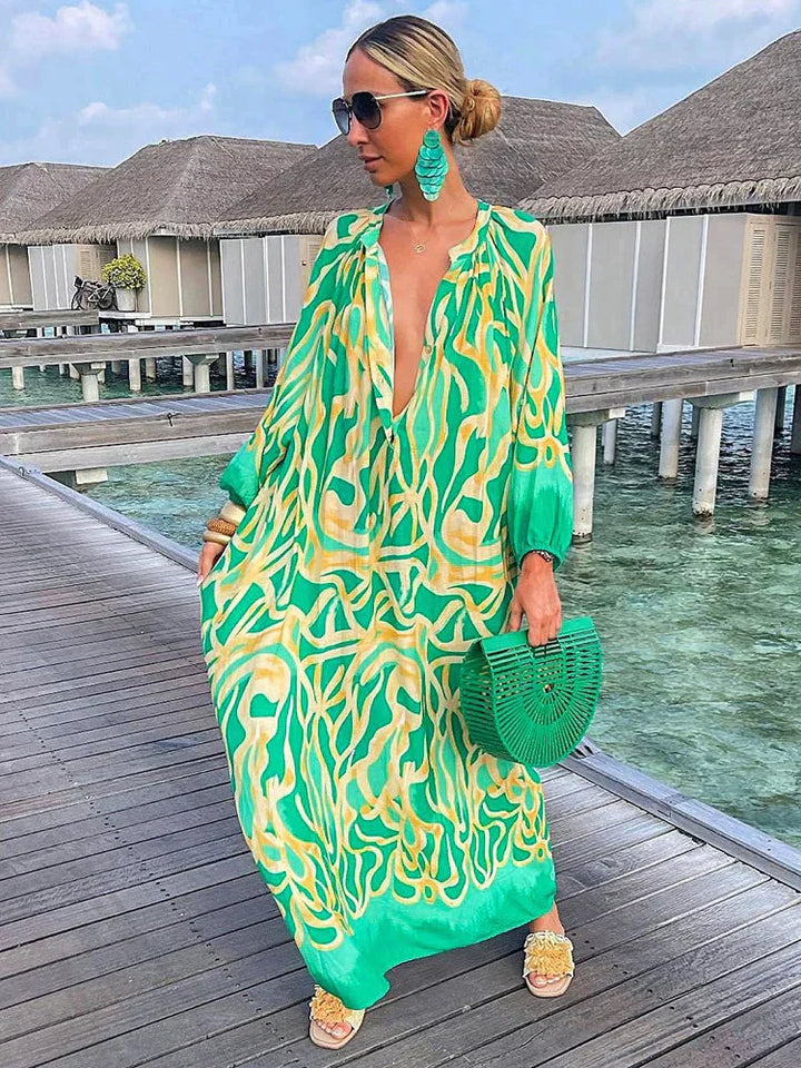 Robe d'été longue fluide décontractée pour femme, style boho chic, imprimée, col V, manches longues.