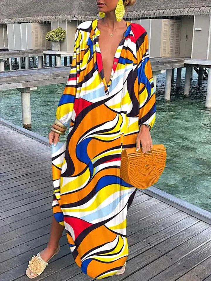 Robe longue d'été femme bohème chic, fluide et élégante, imprimée, col V, manches longues, plage.