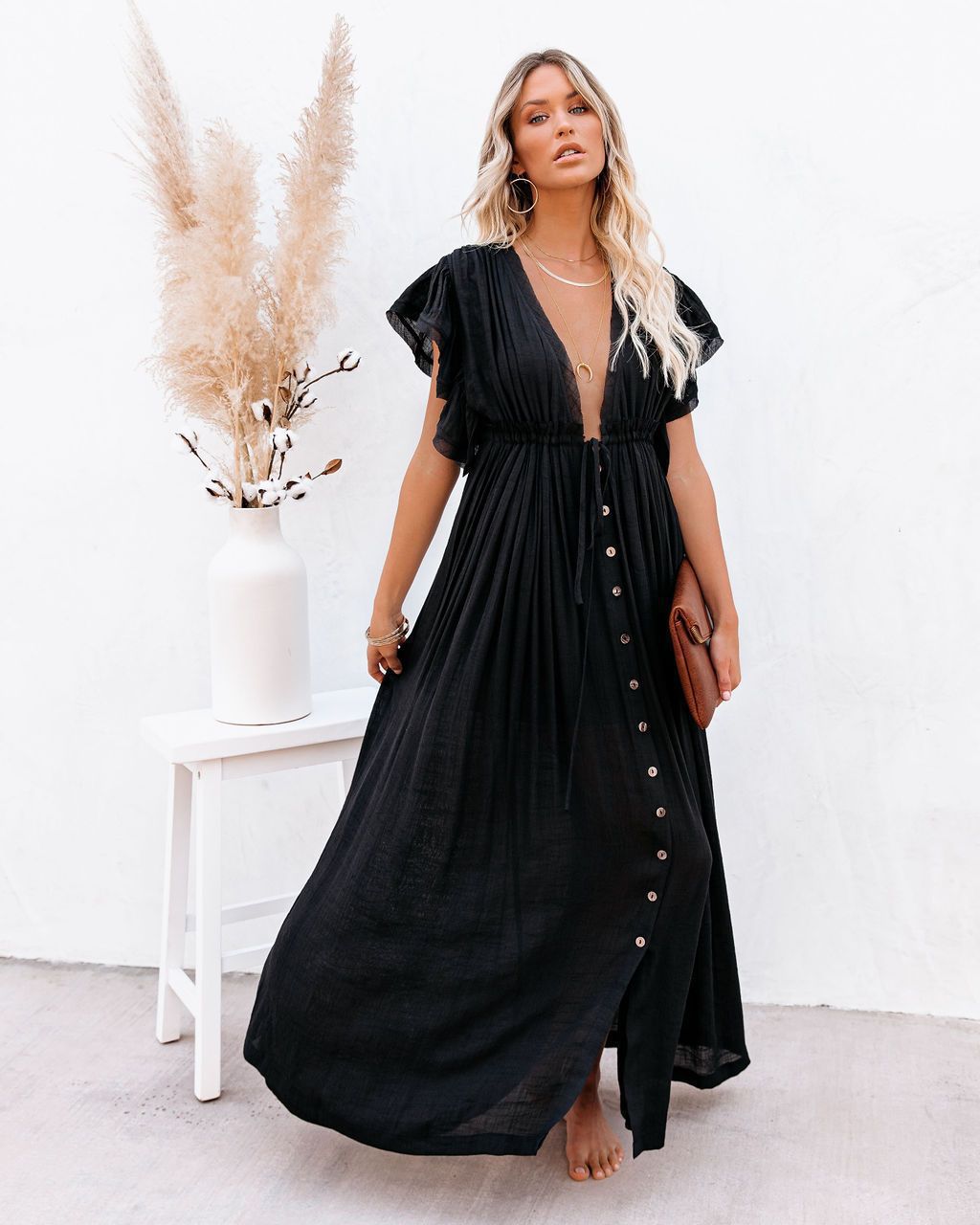 Robe longue bohème blanche, maxi, été. Style fluide et élégant.