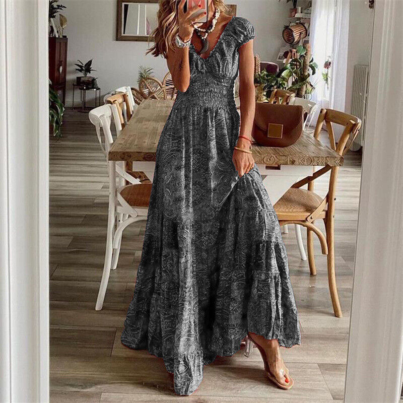 "Robe longue bohème femme élégante avec coupe près de la taille, tissu léger et fluide pour style chic et décontracté."