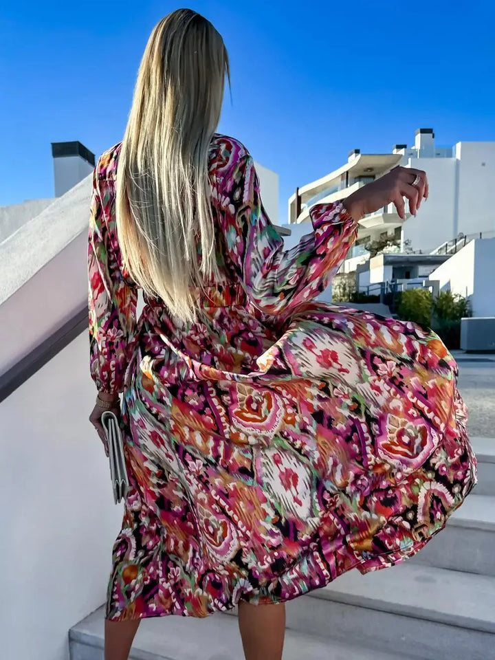Maxi robe d'été bohème femme, imprimé léger et fluide, idéale pour un look stylé et décontracté.