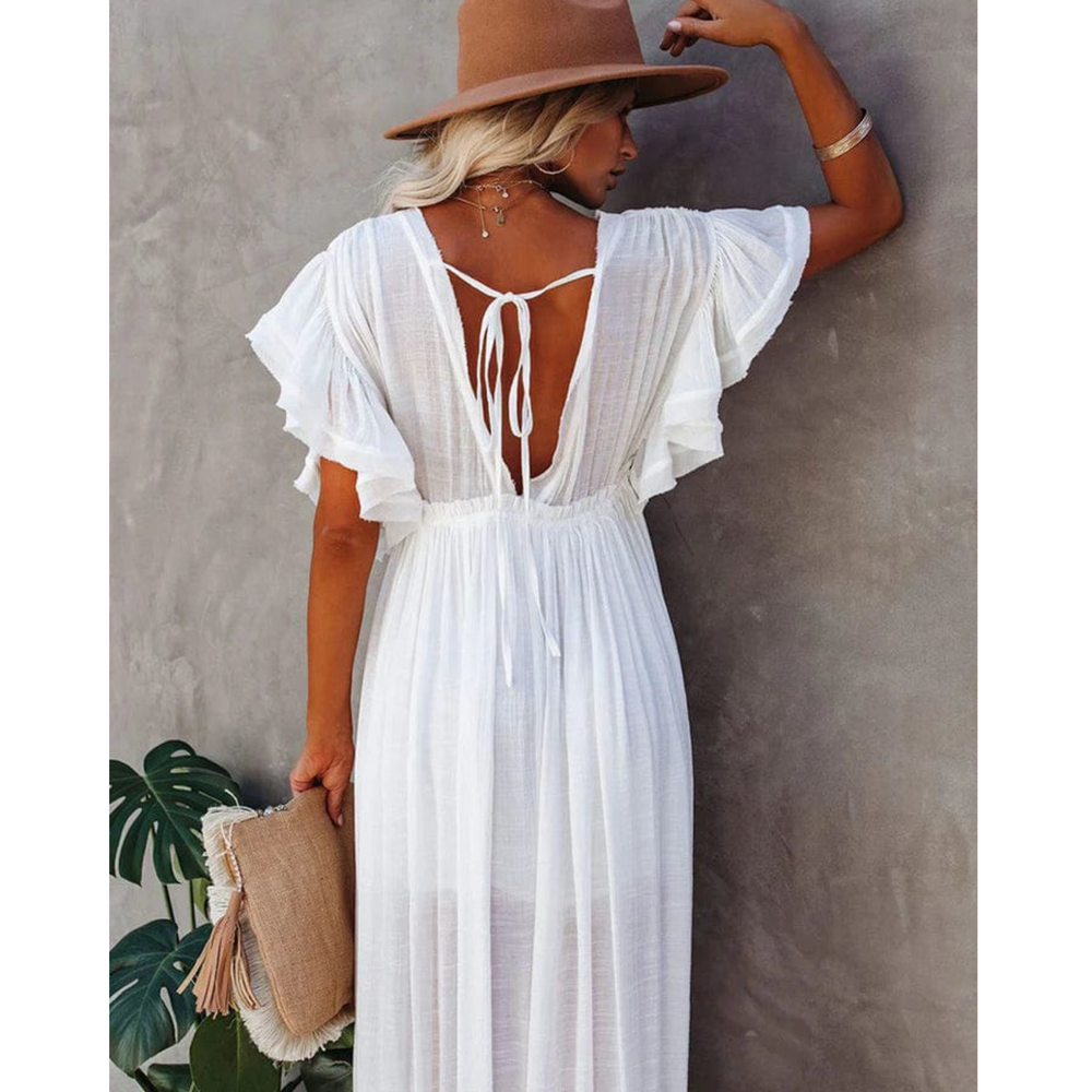 "Robe longue d'été fluide et élégante pour femme, couleur claire, style ample, parfaite pour les journées chaudes."