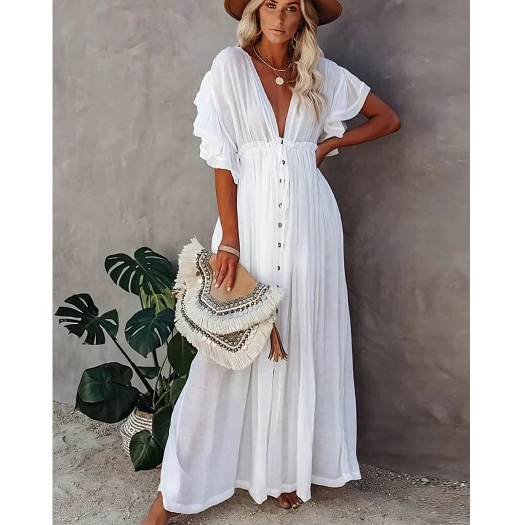 "Robe longue d'été fluide et élégante pour femme, couleur claire, style ample, parfaite pour les journées chaudes."