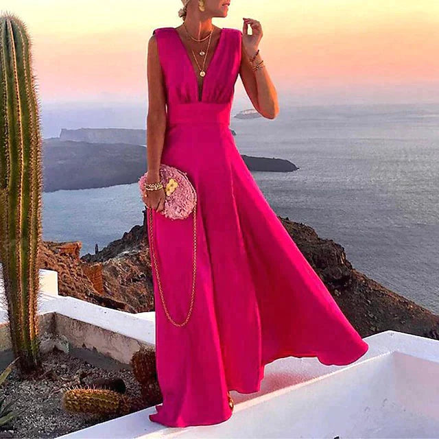 "Robe longue élégante Aurélie bleue avec tissu fluide parfait pour toutes occasions, style sophistiqué et confort optimal."