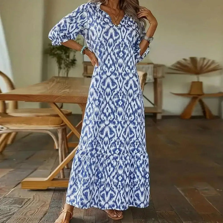 "Robe longue élégante en coton, coupe fluide et légère, idéale pour l'été, flatte toutes les silhouettes."