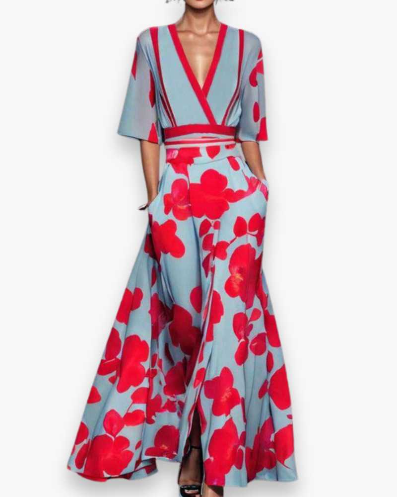 Robe longue élégante femme, soirée glamour, motif floral captivant, coupe fluide, manches sophistiquées.