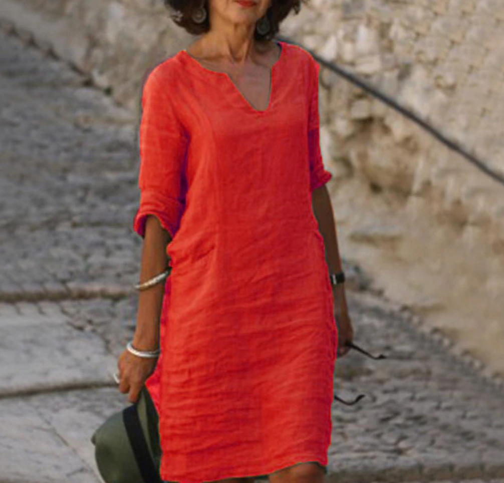 Robe longue en lin, manches longues, col V.  Coupe fluide et élégante.  Parfait pour un style décontracté chic.