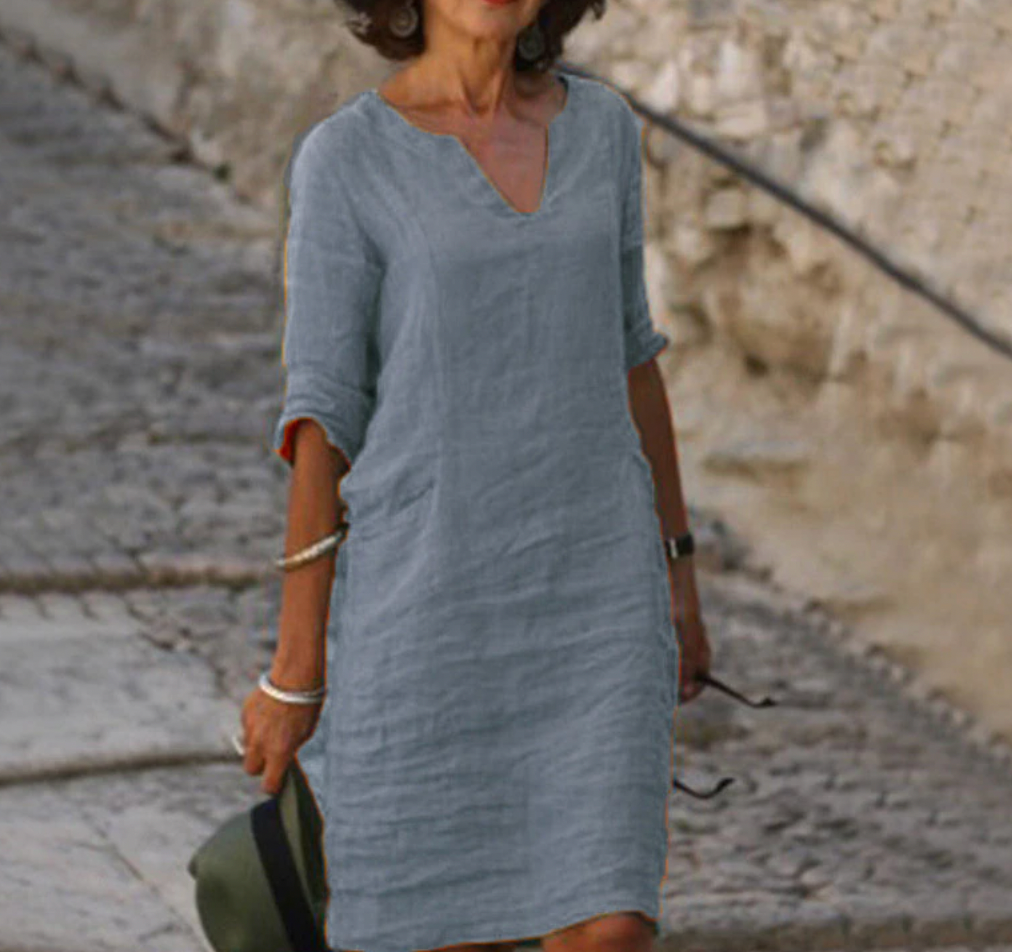 Robe longue en lin, manches longues, col V.  Coupe fluide et élégante.  Parfait pour un style décontracté chic.