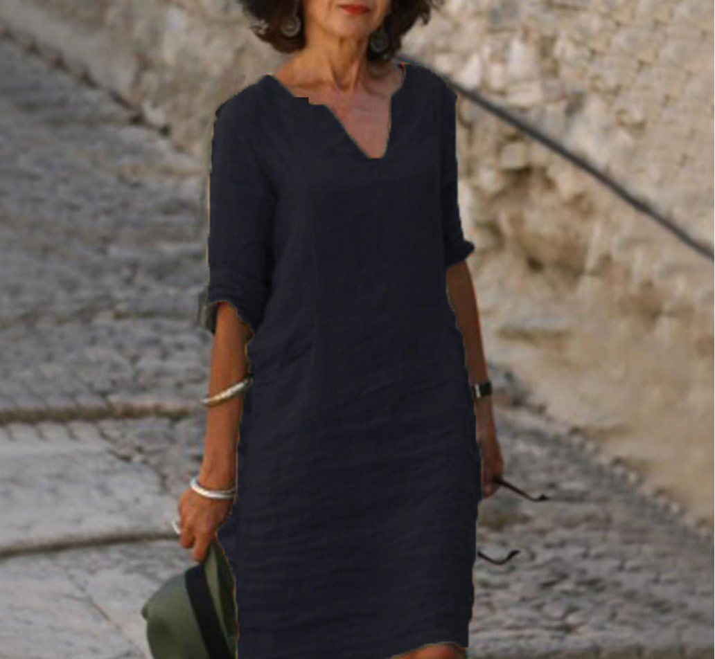Robe longue en lin, manches longues, col V.  Coupe fluide et élégante.  Parfait pour un style décontracté chic.