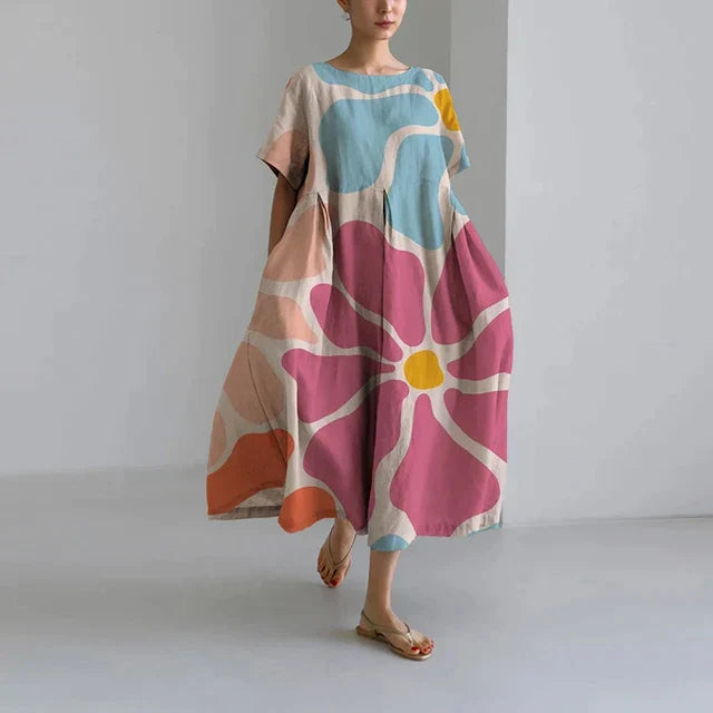 Robe longue estivale, imprimé floral, fluide et élégante.  Parfait pour l'été.