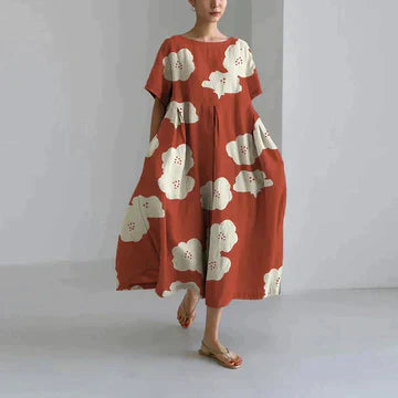 Robe longue estivale, imprimé floral, fluide et élégante.  Parfait pour l'été.