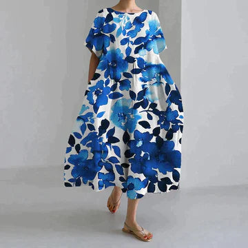 Robe longue estivale, imprimé floral, fluide et élégante.  Parfait pour l'été.
