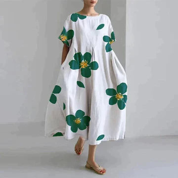 Robe longue estivale, imprimé floral, fluide et élégante.  Parfait pour l'été.