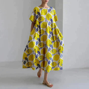 Robe longue estivale, imprimé floral, fluide et élégante.  Parfait pour l'été.