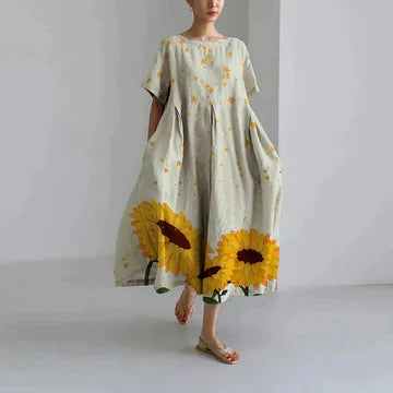 Robe longue estivale, imprimé floral, fluide et élégante.  Parfait pour l'été.