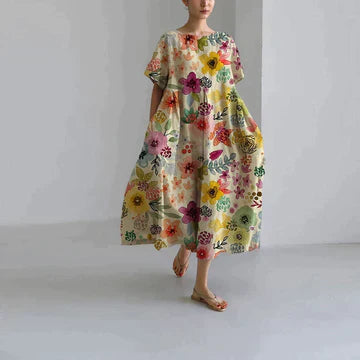 Robe longue estivale, imprimé floral, fluide et élégante.  Parfait pour l'été.