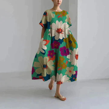 Robe longue estivale, imprimé floral, fluide et élégante.  Parfait pour l'été.