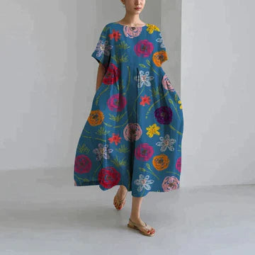 Robe longue estivale, imprimé floral, fluide et élégante.  Parfait pour l'été.