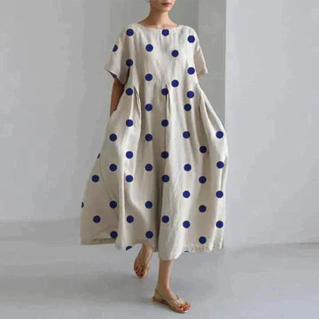 Robe longue estivale, imprimé floral, fluide et élégante.  Parfait pour l'été.