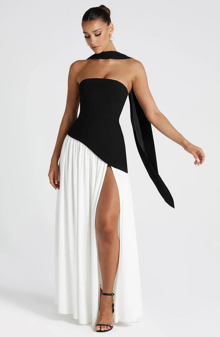 "Robe longue fendue deux tons bustier, silhouette élégante, fente haute et tissu fluide pour un look sophistiqué."