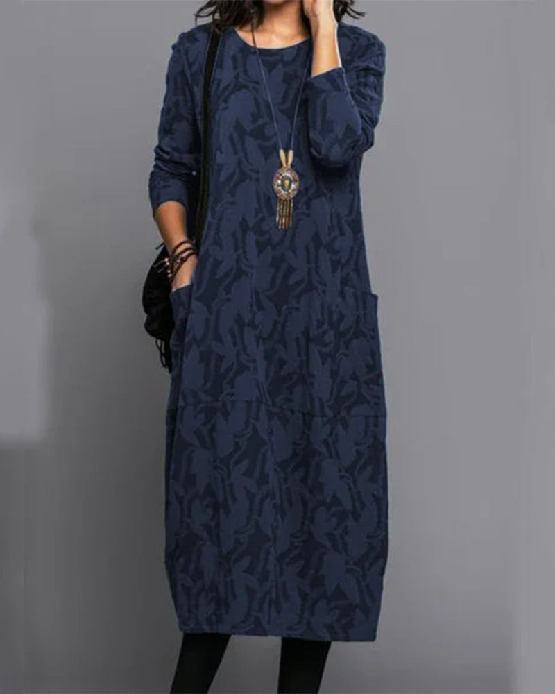 Élégante robe longue fleurie pour femme, manches longues, idéale pour détente ou quotidien. Avec poches discrètes.
