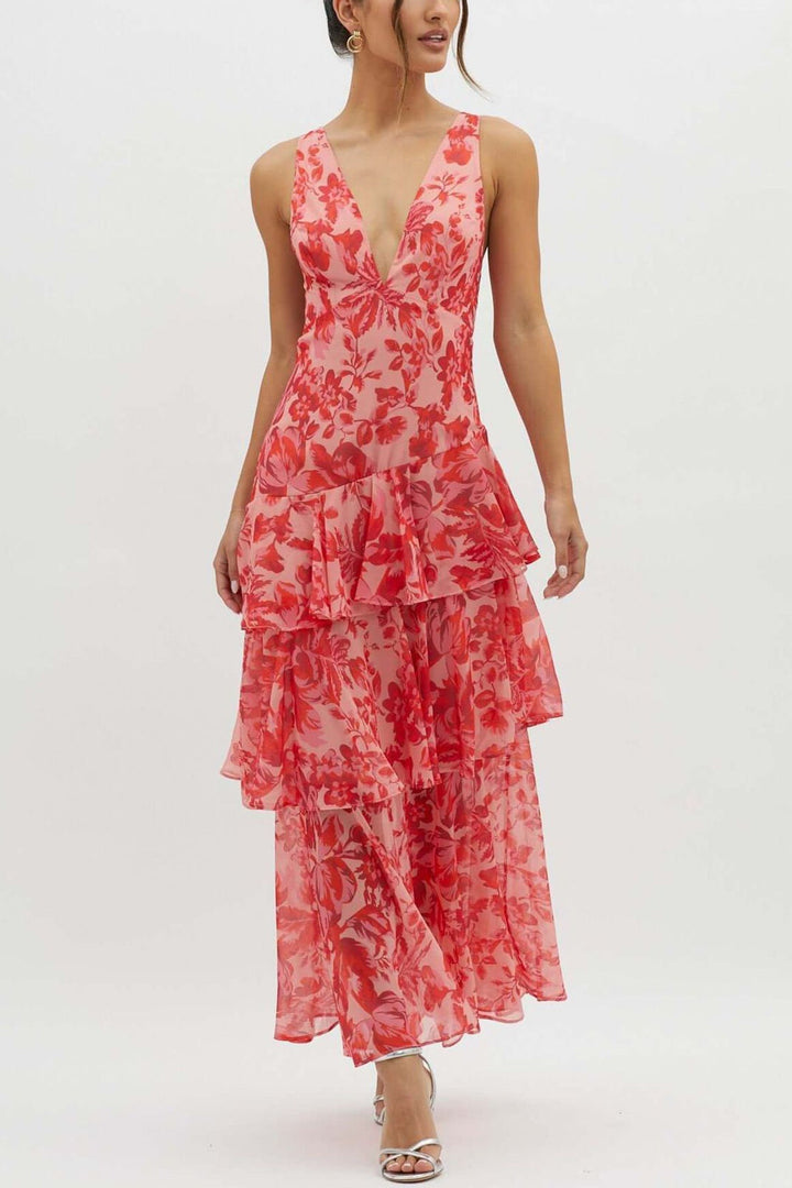 Superbe robe fleurie à volants, coupe longue, pour un style féminin et élégant en toute occasion.
