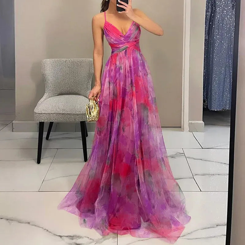 Robe d'été longue femme à motif floral, confortable et fluide. Style décontracté chic pour les beaux jours.