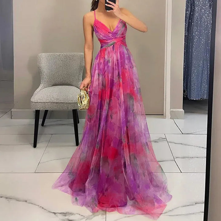 Robe d'été longue femme à motif floral, confortable et fluide. Style décontracté chic pour les beaux jours.