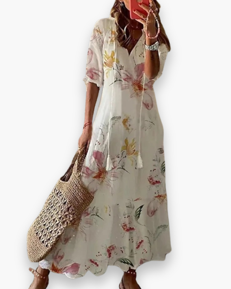 "Robe longue fluide bohème florale pour femme, élégante avec imprimé floral, parfaite pour l'été décontracté ou chic."
