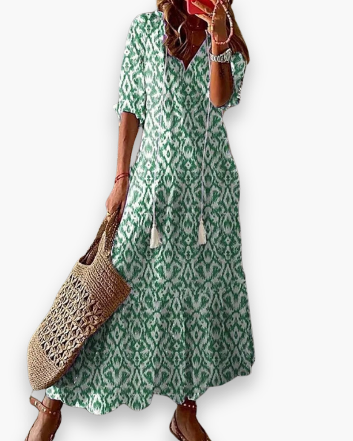 "Robe longue fluide bohème florale pour femme, élégante avec imprimé floral, parfaite pour l'été décontracté ou chic."