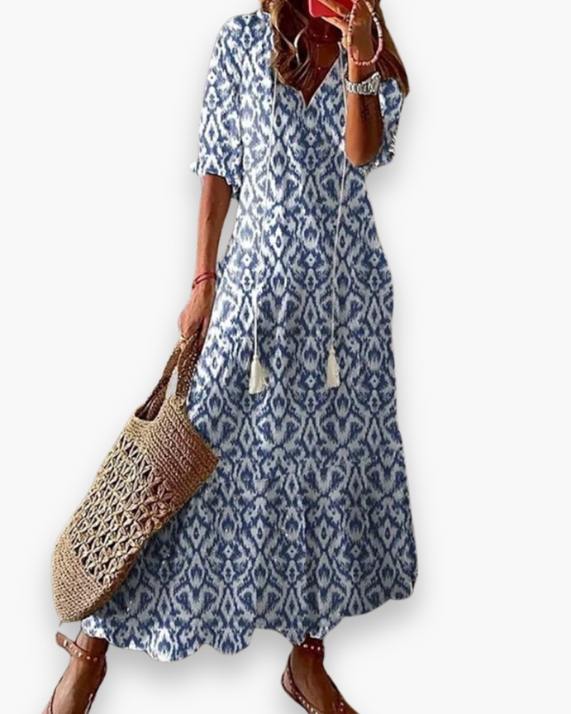 "Robe longue fluide bohème florale pour femme, élégante avec imprimé floral, parfaite pour l'été décontracté ou chic."