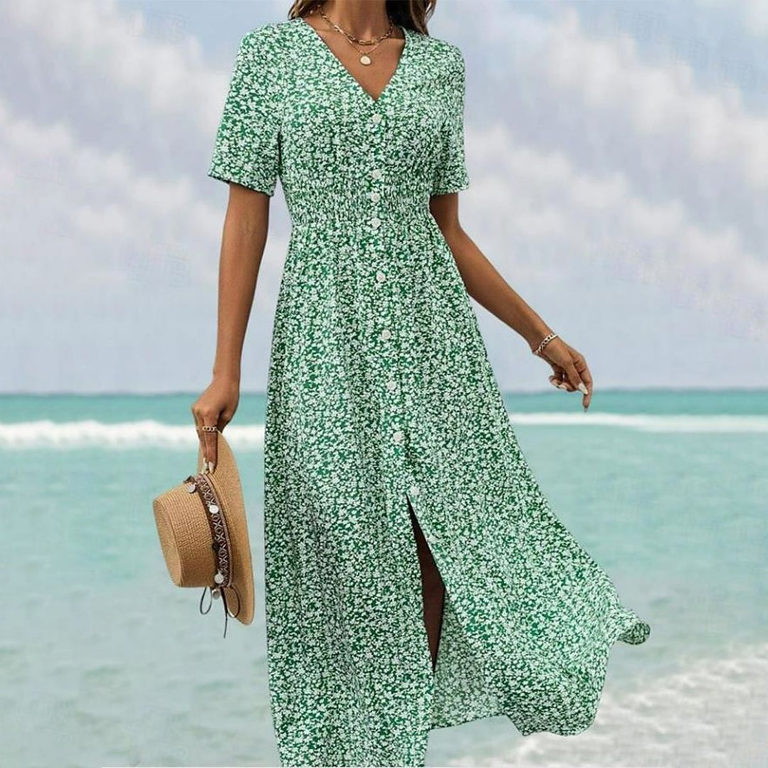 Robe longue fluide, manches courtes, encolure V.  Élégante et chic.  Parfait pour toutes occasions.