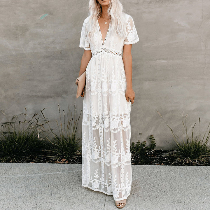 "Robe longue Jasmine élégante, coupe fluide, encolure en V flatteuse, idéale pour un style estival gracieux, tailles S-XL."