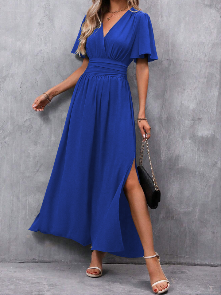 Magnifique robe de soirée femme chic. Jupe fluide et ceinture sophistiquée pour cérémonies et événements élégants.