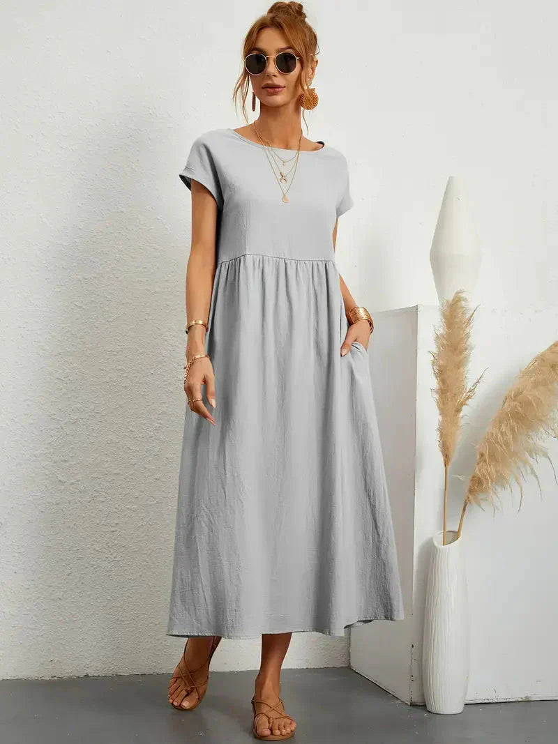 Robe Melody femme, vêtement fluide et chic. Confort décontracté pour l'été, la plage et les vacances.