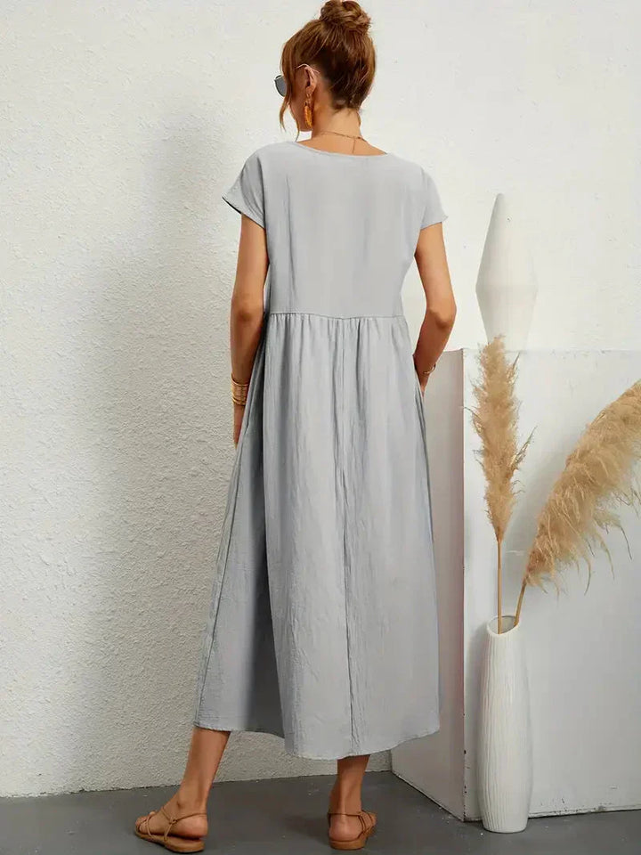 Robe longue d'été fluide Melody, élégance décontractée pour femme. Parfaite pour les vacances et la plage.