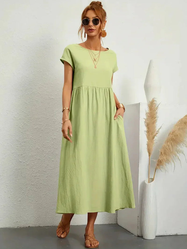 Vêtement femme mode: Robe Melody longue et fluide, pour un look estival élégant et décontracté.