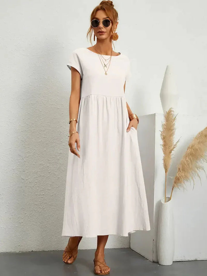 Élégante robe longue Melody femme pour l'été. Design fluide et décontracté, parfait pour les vacances.