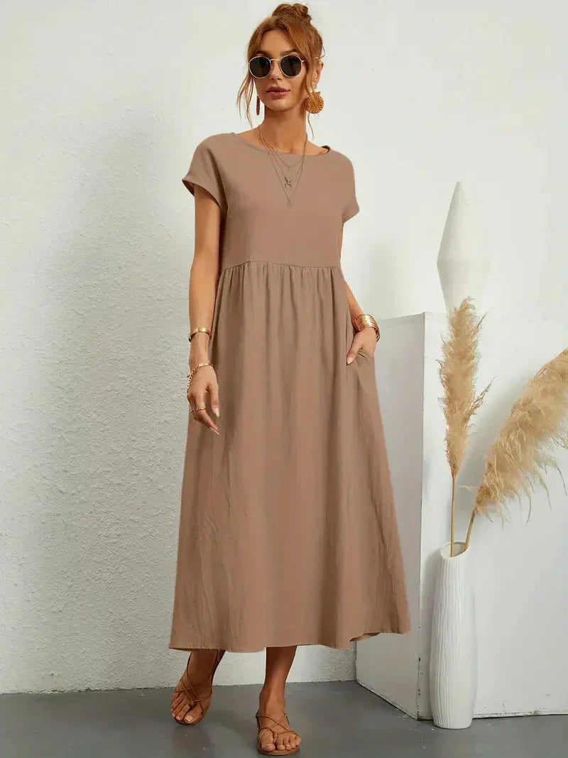 Robe Melody, longue et fluide, pour femme. Élégance estivale décontractée, idéale pour les vacances d'été.