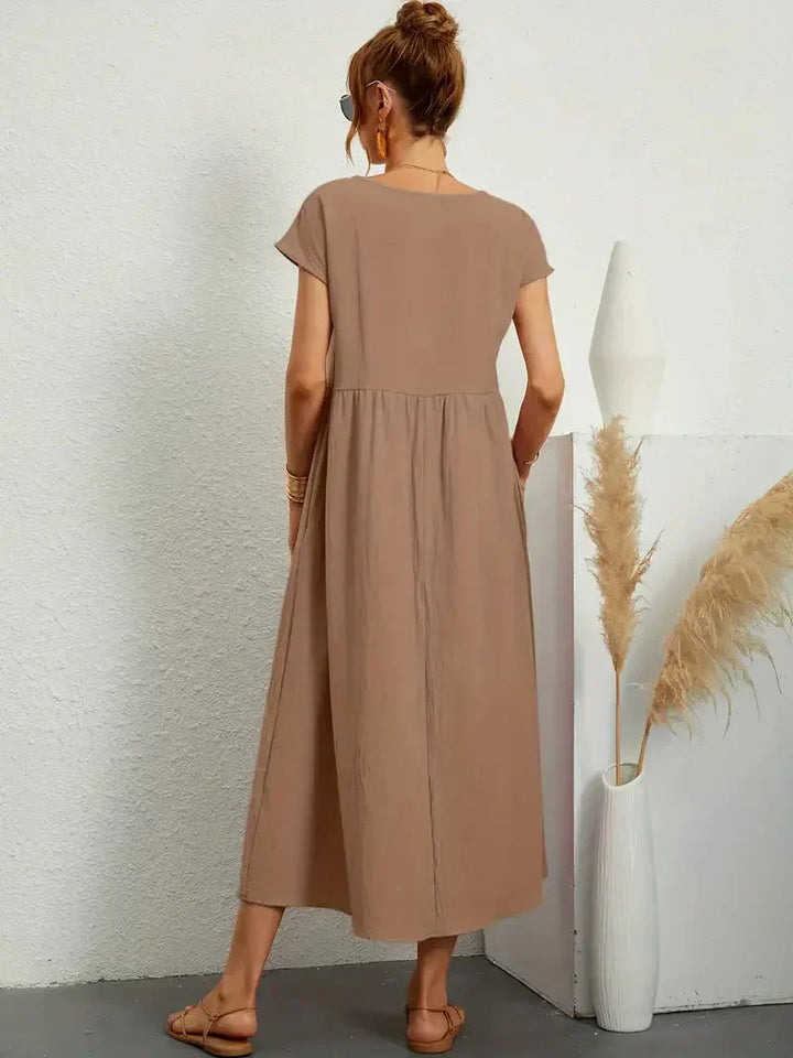 Maxi robe Melody femme, confortable et fluide. Parfaite pour l'été, la plage ou un style décontracté chic.