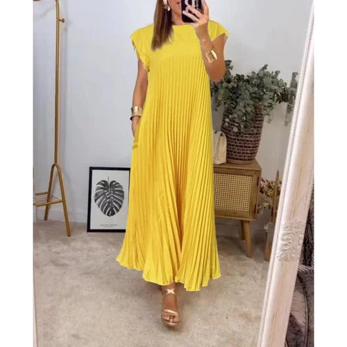 Robe longue plissée, élégante et chic.  Coupe fluide, idéale pour toutes occasions.