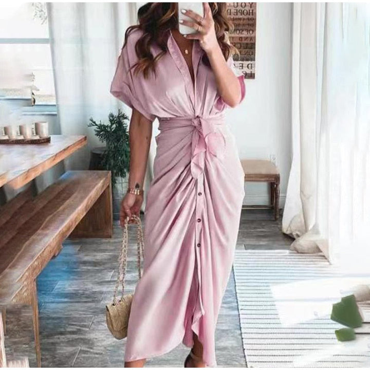 Robe longue à boutons Sorina, chic et confortable, idéale pour la femme active et élégante.