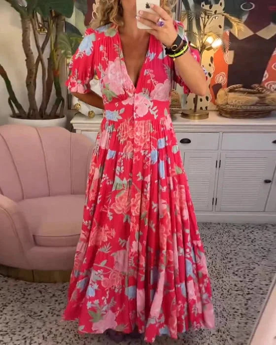 Robe maxi à col V imprimé floral, manches courtes bouffantes, style ligne A, élégance estivale féminine.