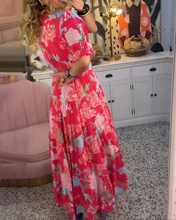 Robe maxi à col V imprimé floral, manches courtes bouffantes, style ligne A, élégance estivale féminine.