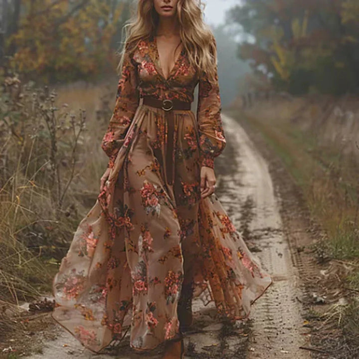Robe maxi femme à volants style bohème chic, coupe longue et fluide. Idéale pour un confort estival décontracté et sophistiqué.