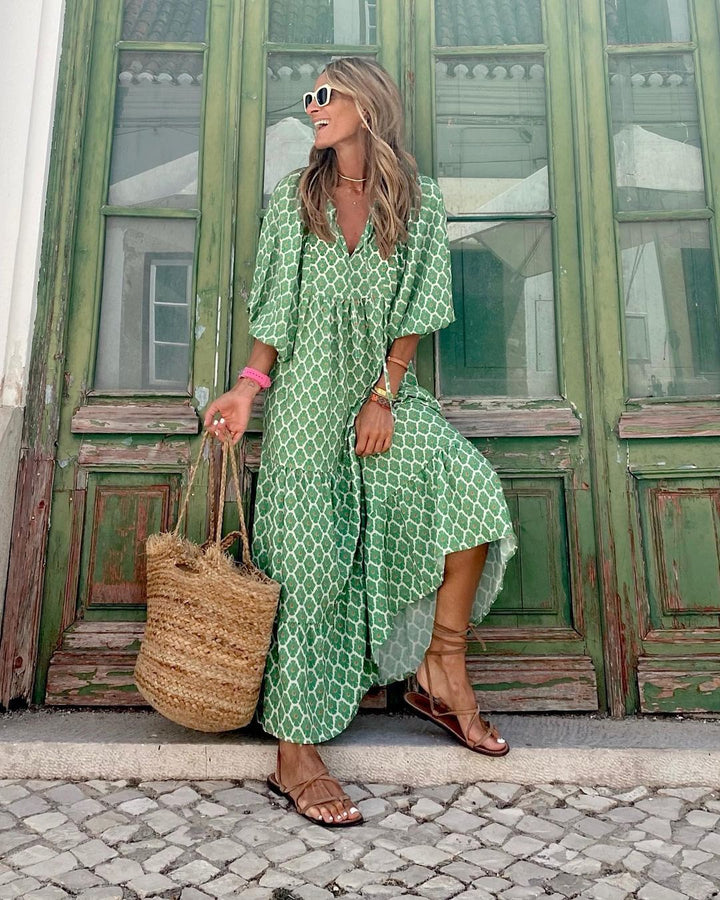 Robe maxi bohème fluide, coupe longue et élégante. Motifs bohèmes.  Parfait pour un look décontracté ou habillé.