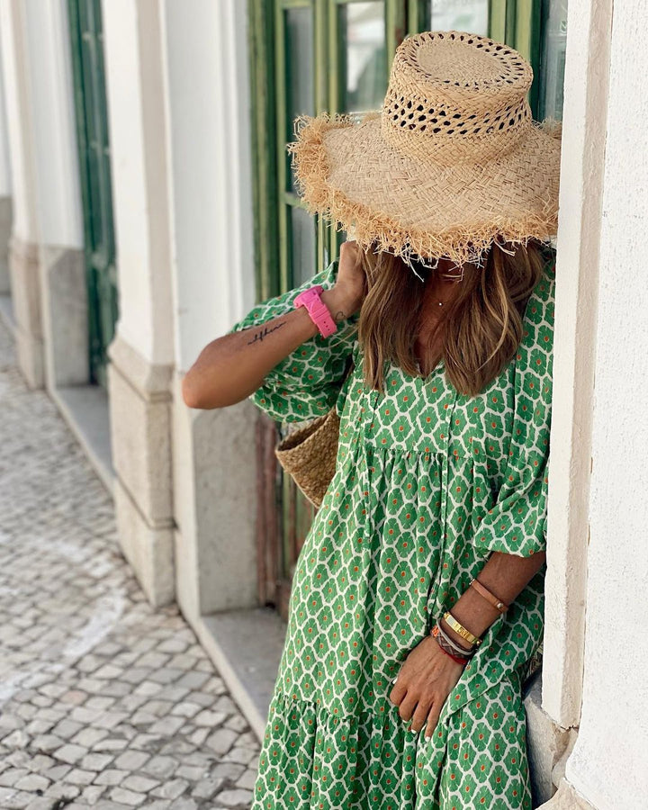 Robe maxi bohème fluide, coupe longue et élégante. Motifs bohèmes.  Parfait pour un look décontracté ou habillé.