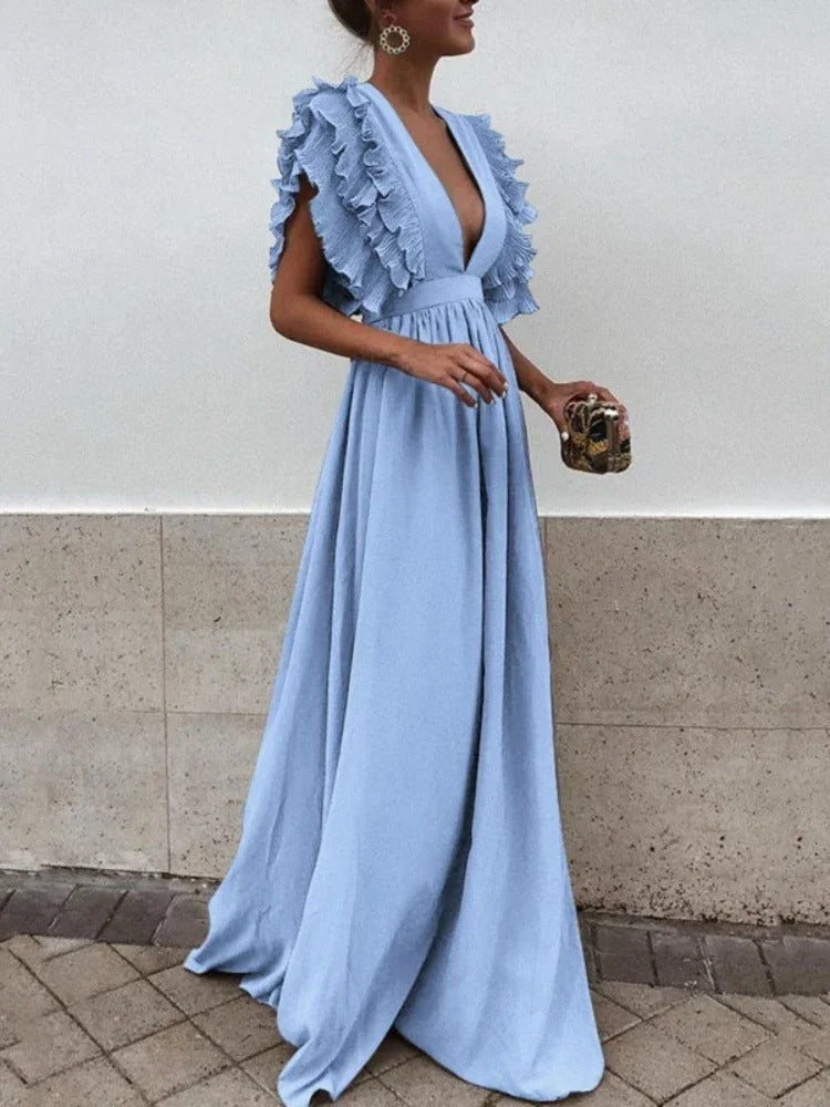 Robe maxi femme élégante, col V, coupe fluide. Plusieurs couleurs disponibles.
