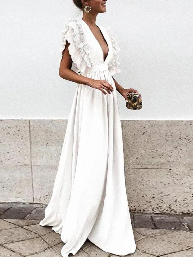 Robe maxi femme élégante, col V, coupe fluide. Plusieurs couleurs disponibles.